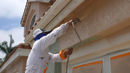 San Diego Painting Contractor with spray gun